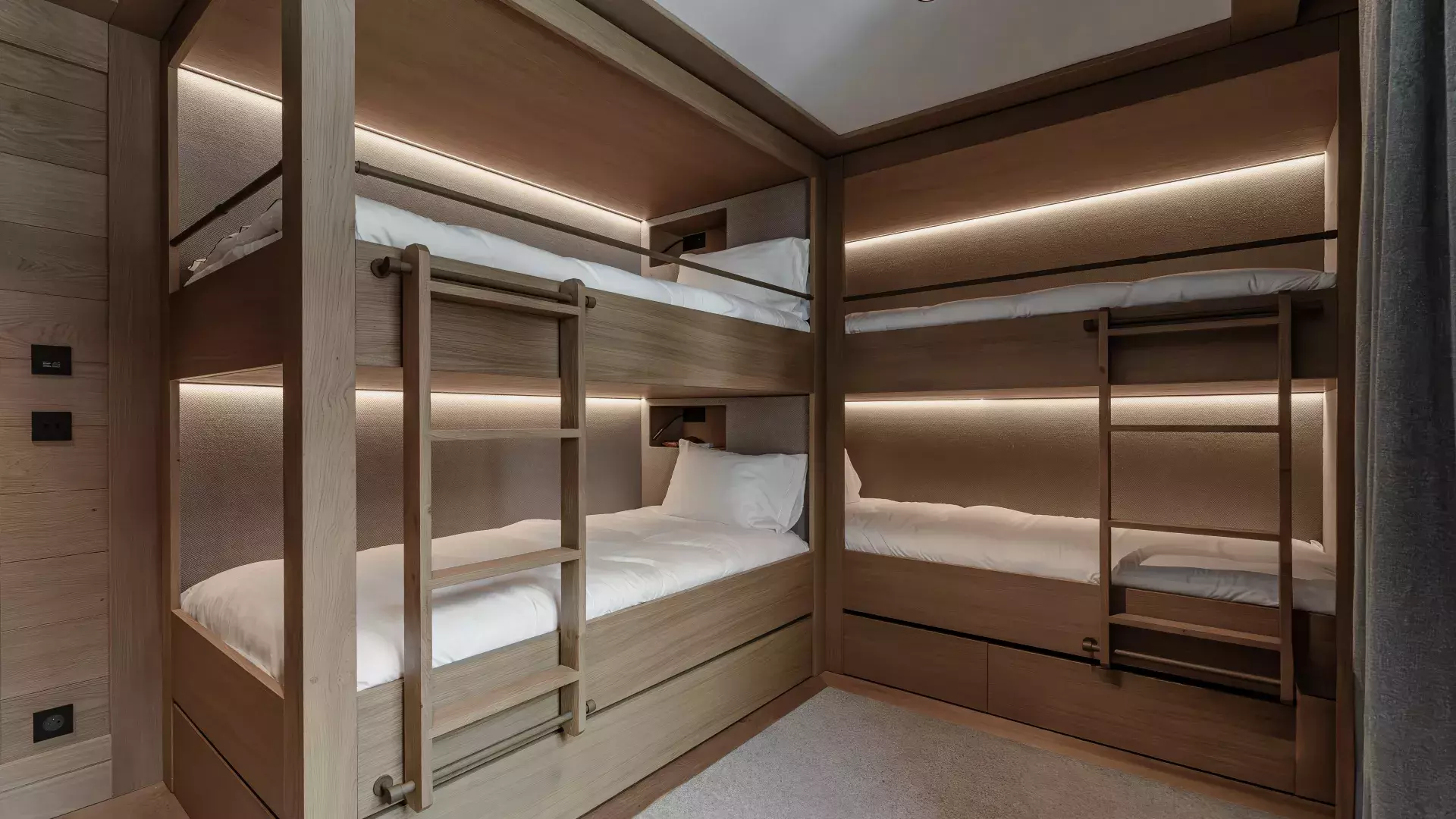 Zone nuit avec lits superposés de l'appartement Cinq